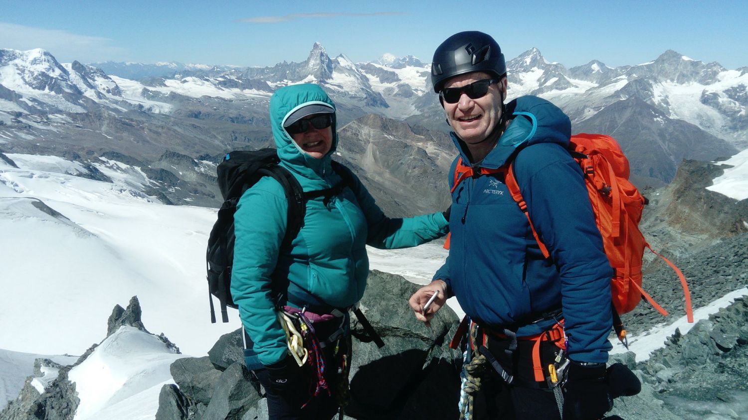  On the summit of the Allalinhorn with the Matterhorn behind 