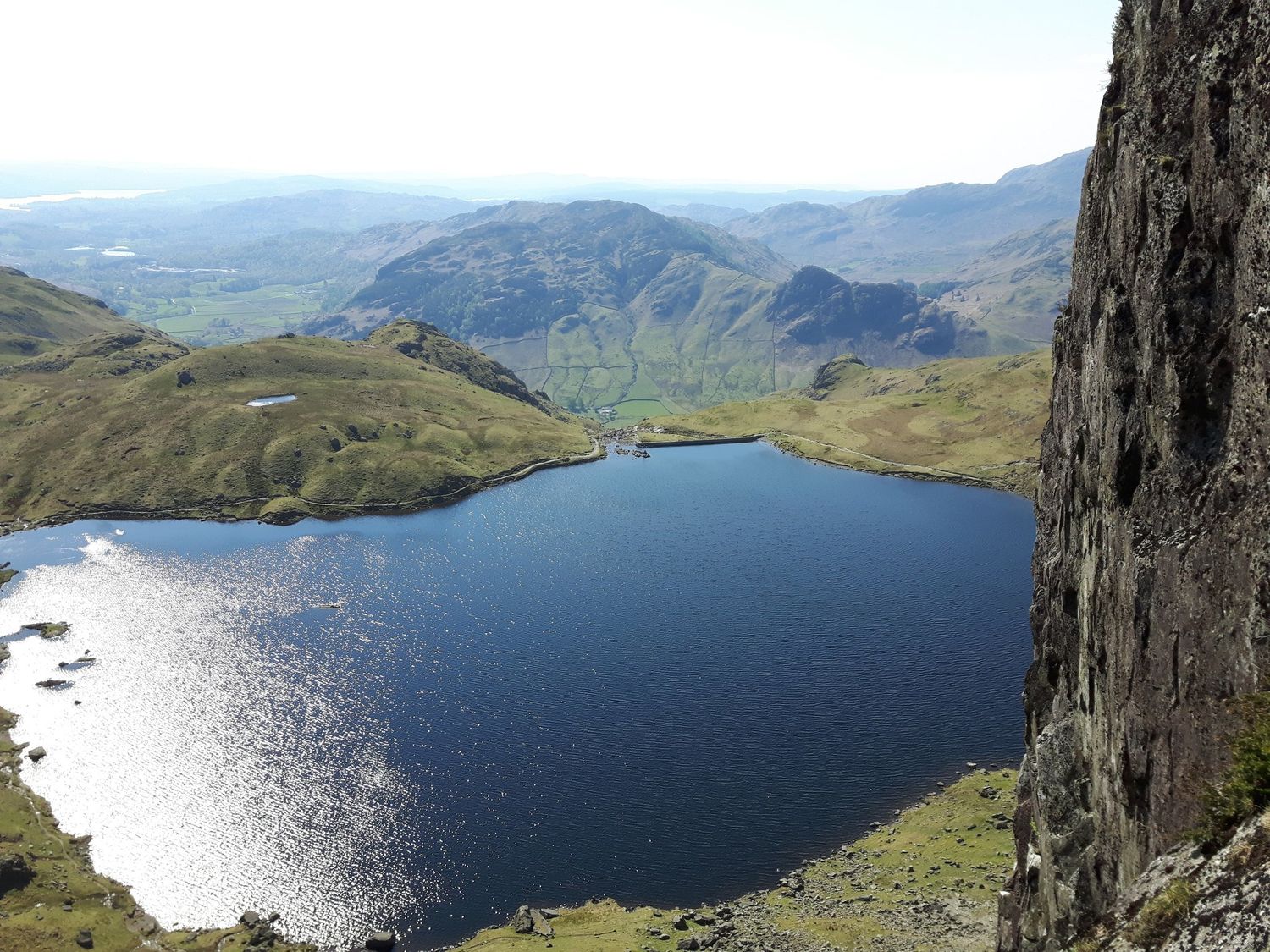  Looking down at Stickle Tarn from Pavey Ark, Langdale - Chris Ensoll Mountain Guide 
