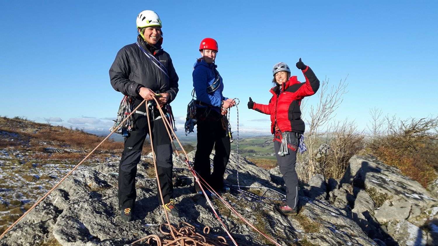  Setting up a belay at the top of a route on a Rock Climbing Instructor course - Chris Ensoll Mountain Guide 