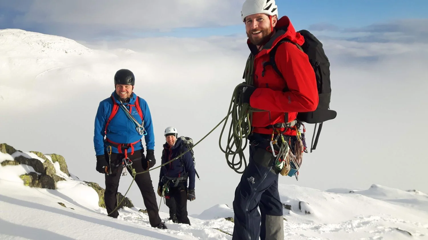 Phil on the left on a snowy day in the Lake District
