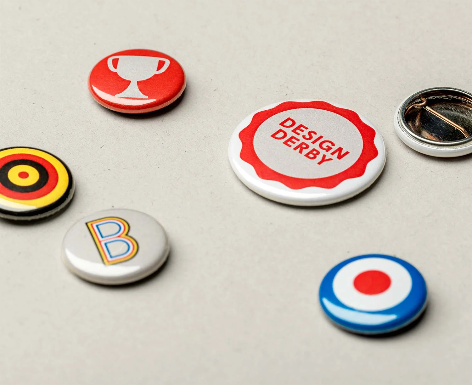 Design Derby buttons, for the opening and for sale in the Museum shop