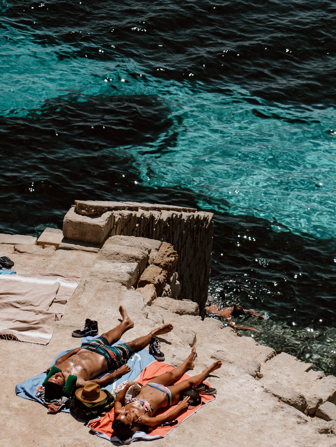 Sunbathers at Bus Marina, Favignana