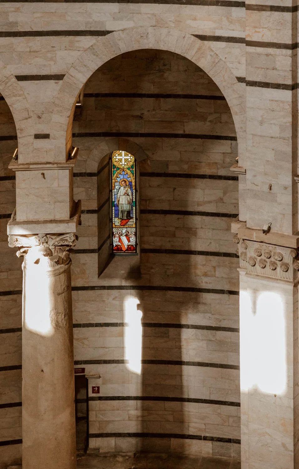 stained glass window inside battistero di san giovanni