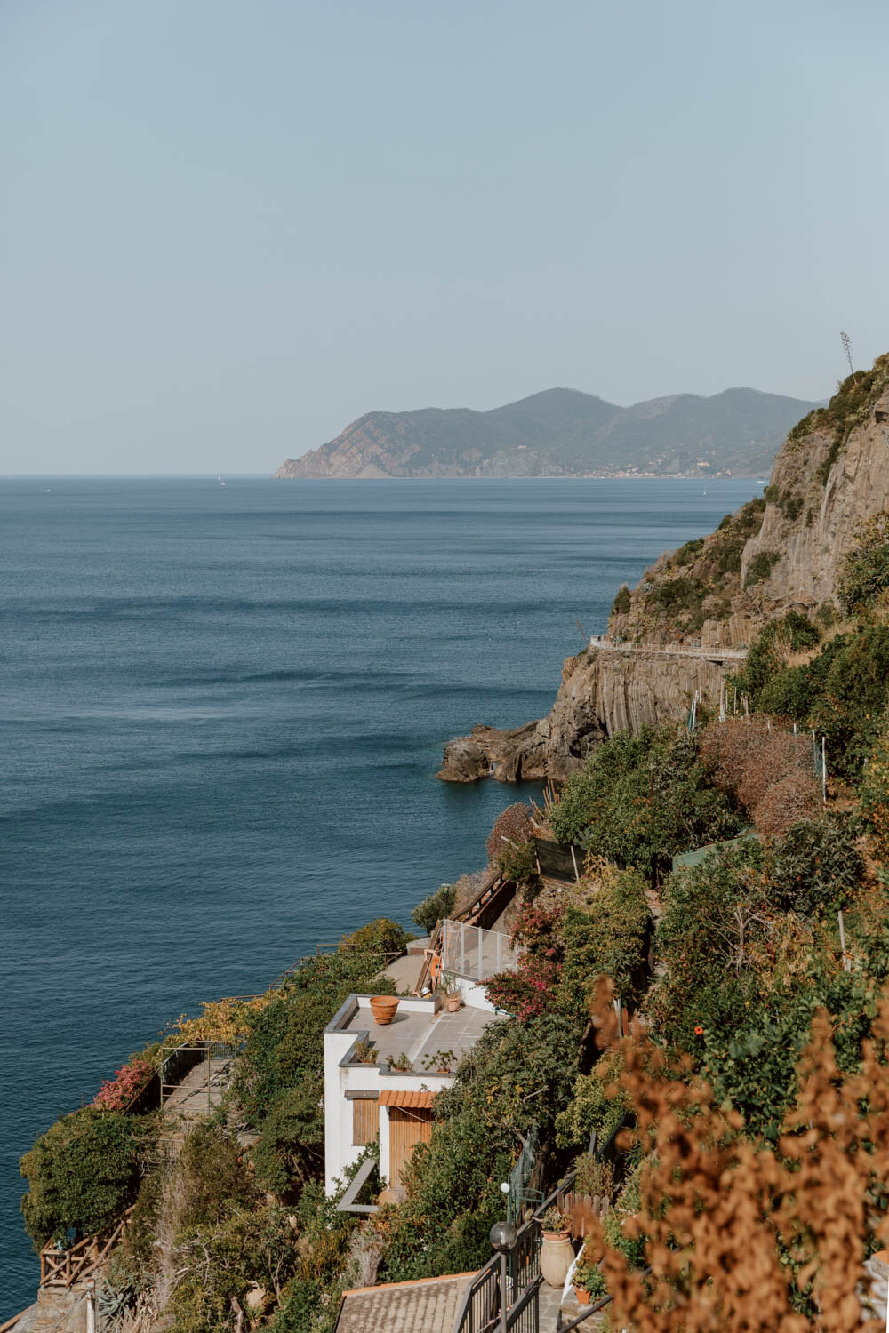 view for house and vineyard and garden with sea and cliffs