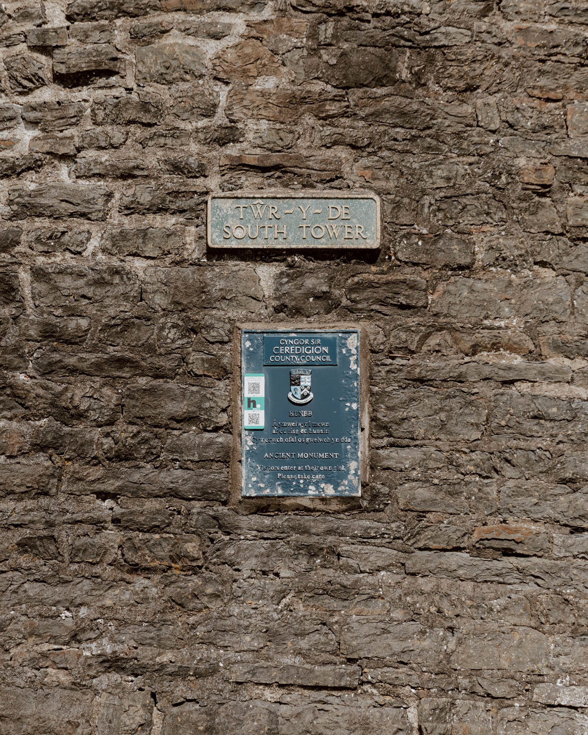 plaque on wall of castle