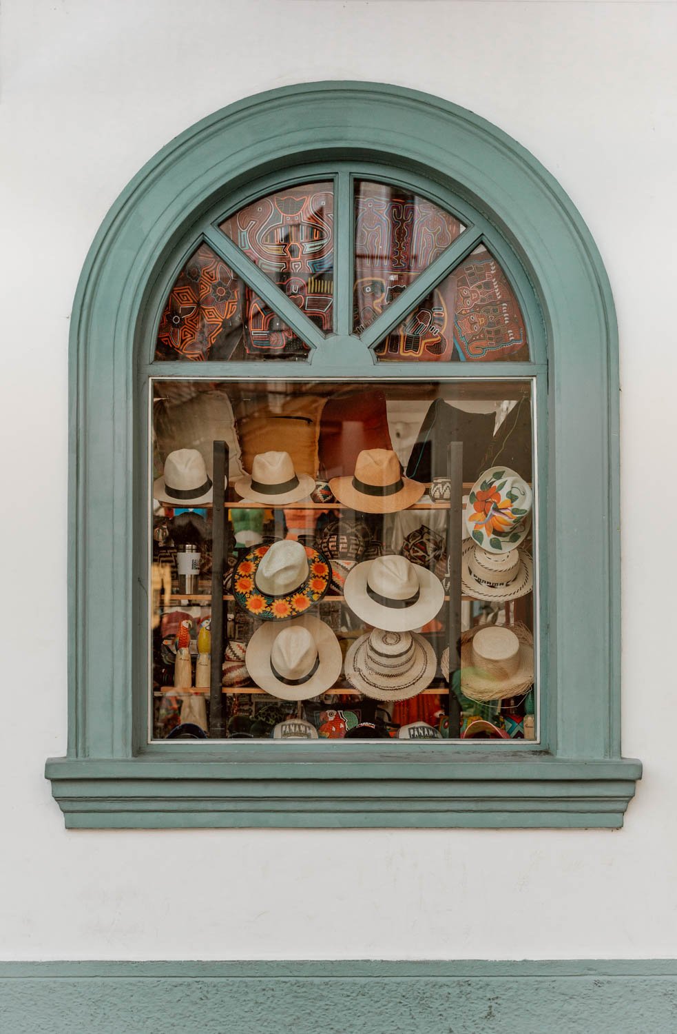 shop window displaying panama hats