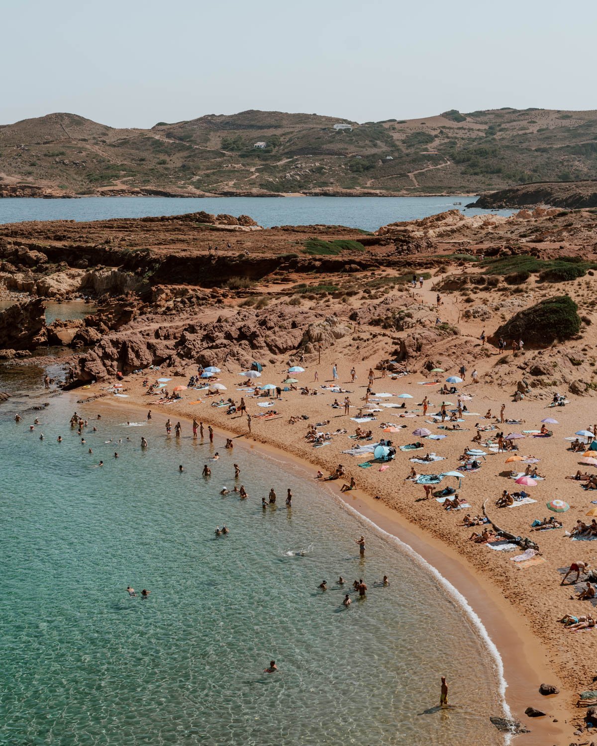 the essentials - // Collection of remote beaches in northeast Menorca// Inaccessible with public transport// Requires a 35-minute walk along the Cami de Cavalls// Nearest town is Fornells// No facilities