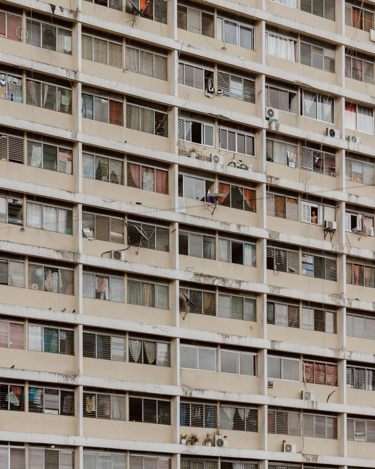 facade of a slightly run down tower block