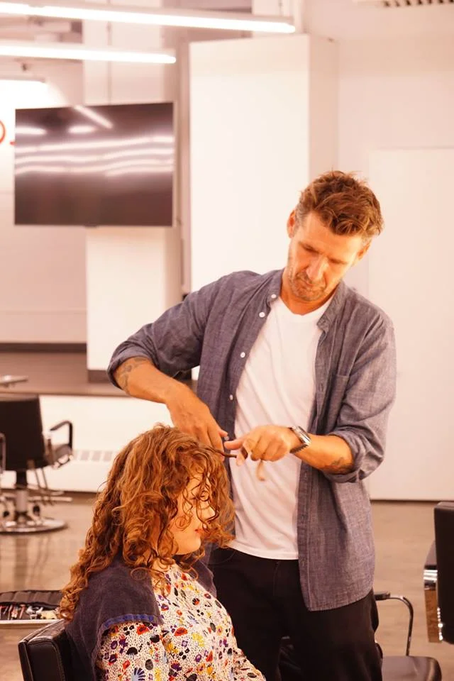 Paul Merritt making curls more shapely.