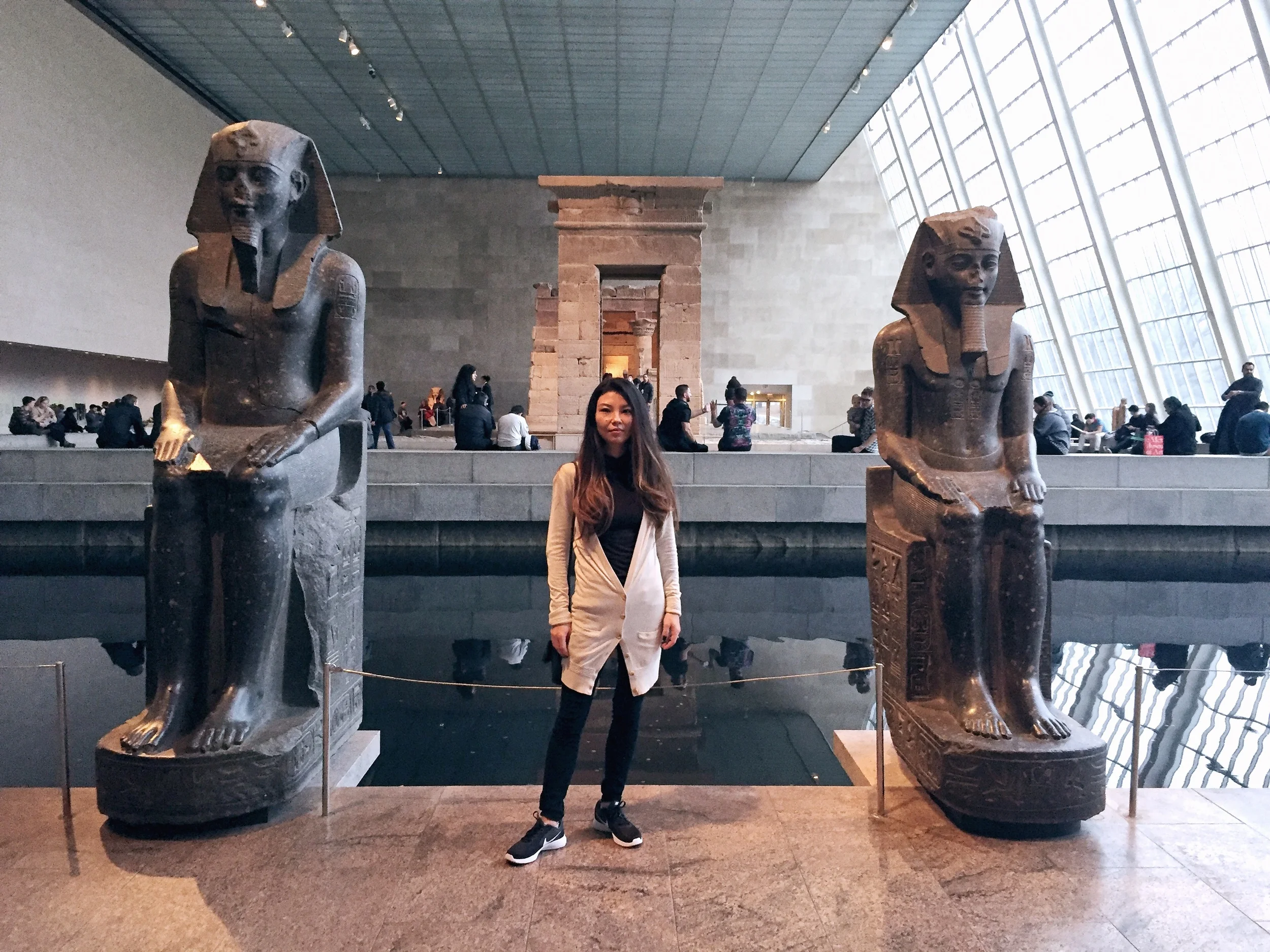 The moat around the Temple of Dendur , an ancient Egyptian temple in the Metropolitan Museum of Art .
