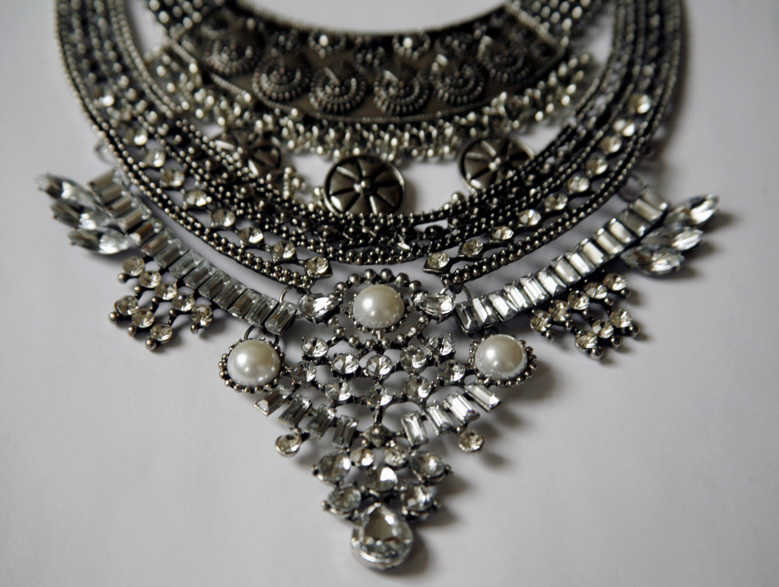 Details from the Amazon necklace.
