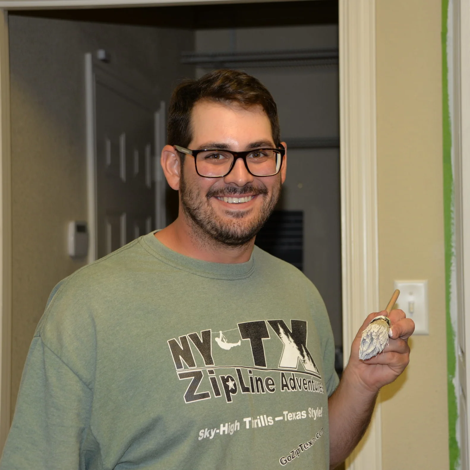 My brother, Carson, helping me paint the kitchen. He made the job a lot easier on me! 