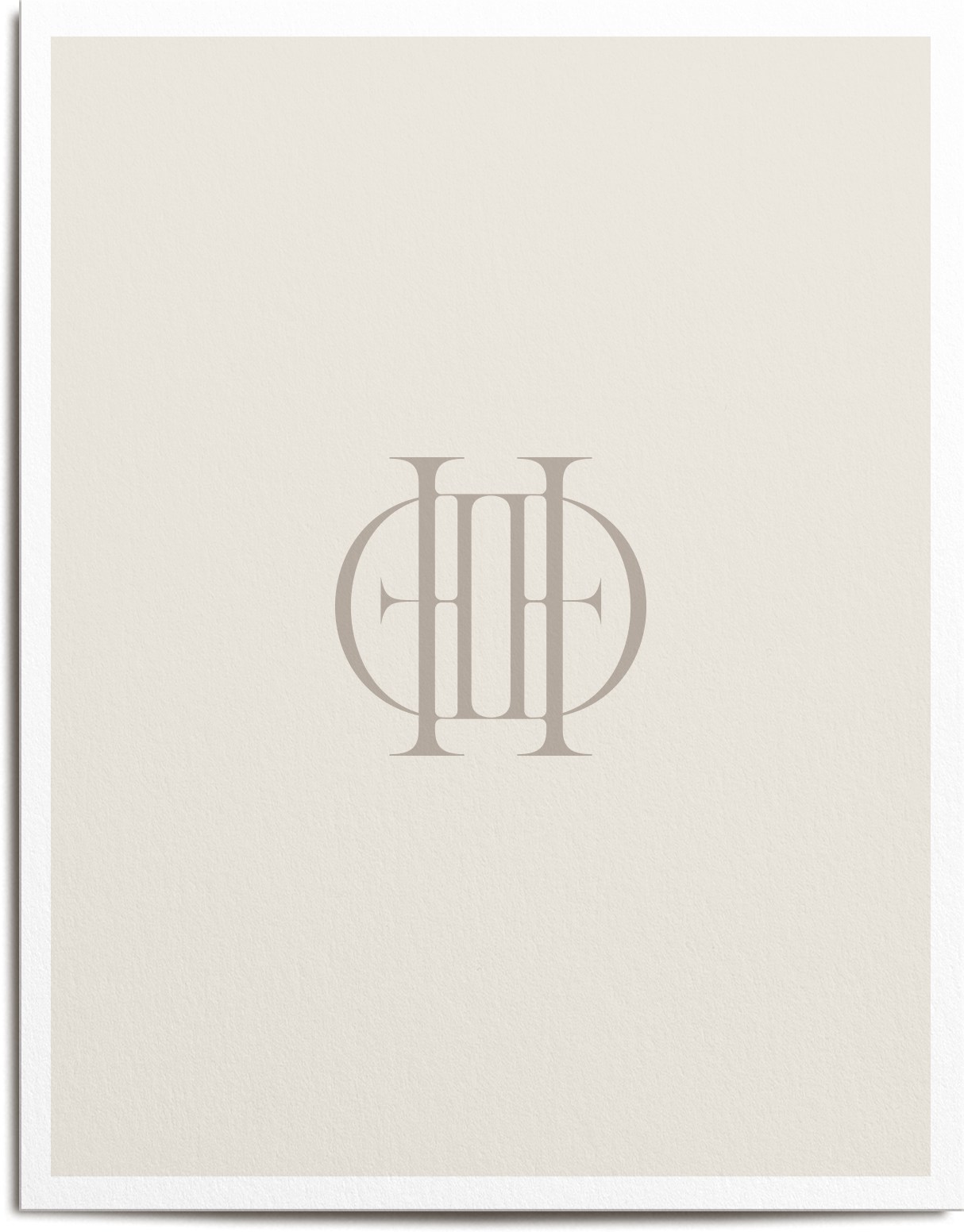 Elegant monogram logo on a cream textured background.