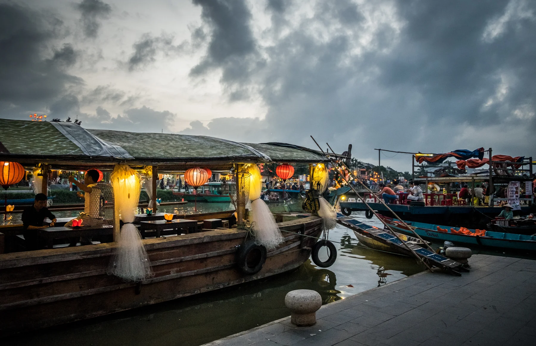 A small boat with paper lotus candles in Hoi an, Vietnam river