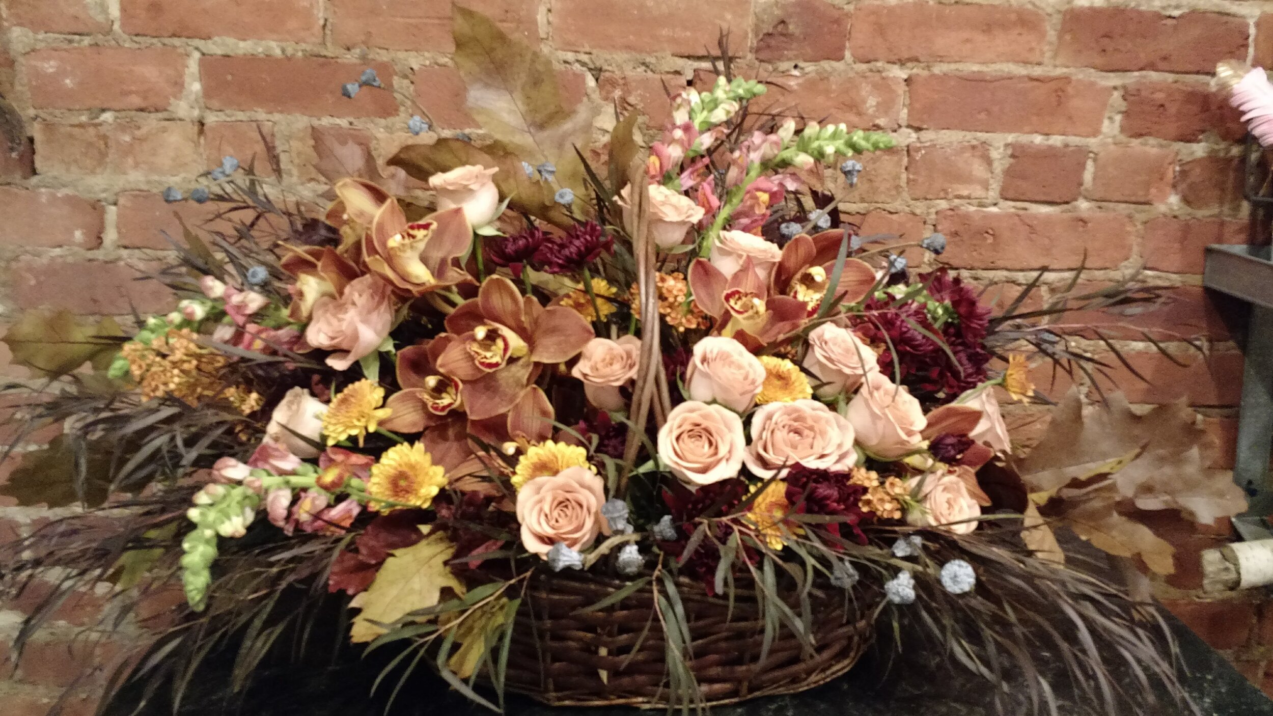 $450 Earth Tone Basket w/ Mocha Orchids and Cappuccino Roses 