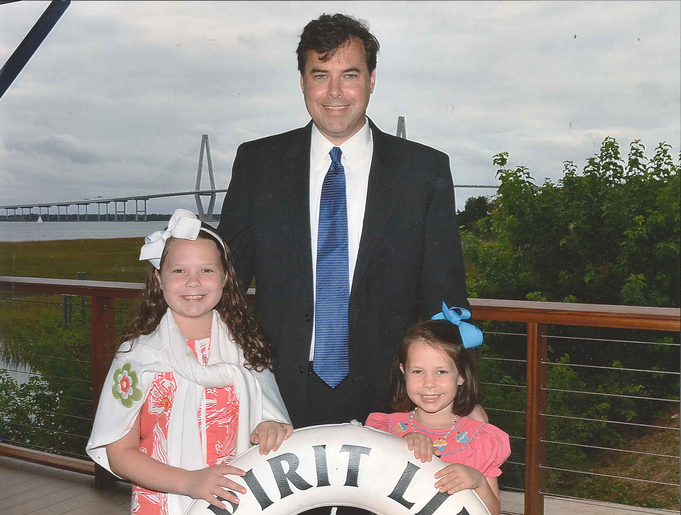 The YMCA father / daughter Indian Princess program is a great opportunity to spend time with my kids and support the greater Charleston YMCA programs at the same time. Events include camping trips, walk for water, pajama bowling, etc. This picture is from a semi-formal harbor dinner cruise at patriots point. Andy Clark