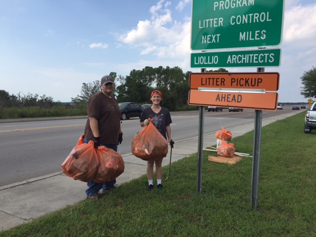 Liollio's Geoff Mohney & Allie Beck helping pick up during last week's Adopt-A-Highway clean up.