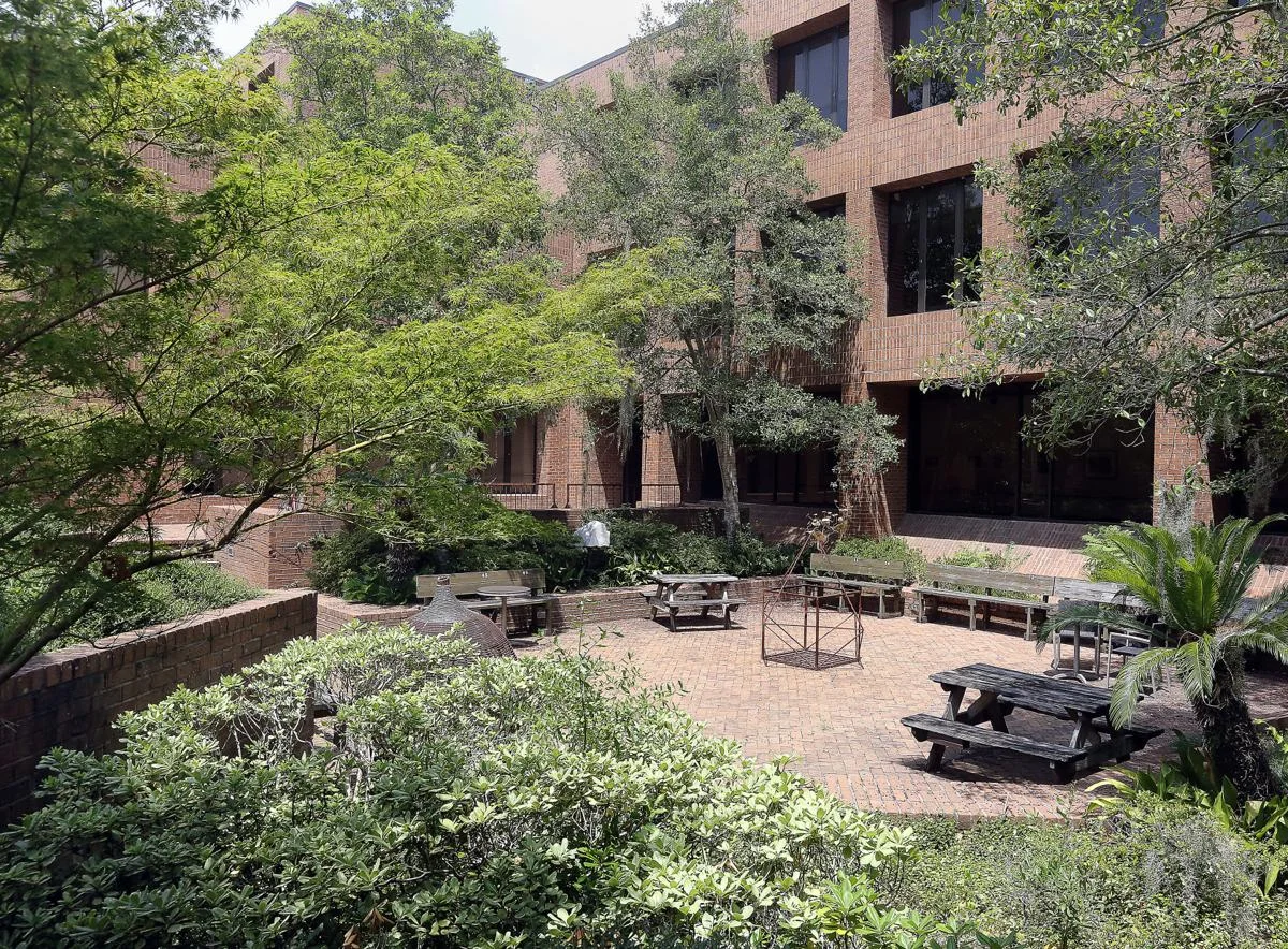 The courtyard at the College of Charleston’s Albert Simons Center for the Arts fronts St. Philip Street and likely will be transformed by the upcoming renovation project led by Liollio Architects. Brad Nettles/Staff - Brad Nettles bnettles@postandcourier.com
