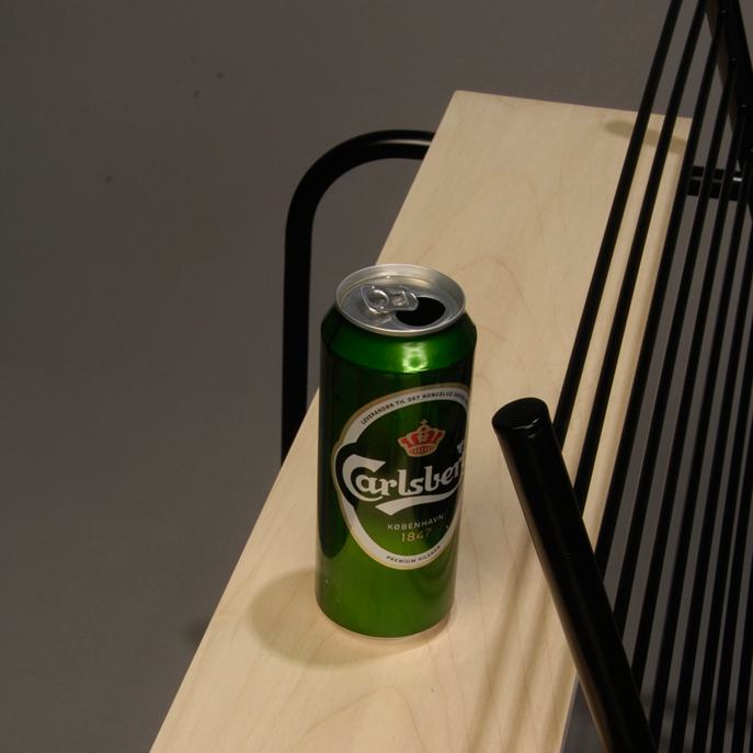 The finished product, with a black powder coat and a Carlsberg