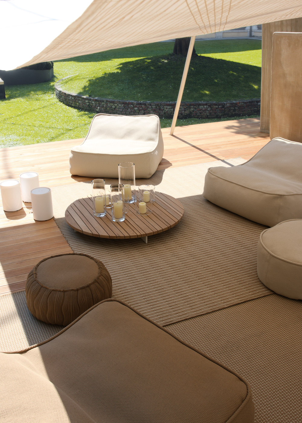 in pool lounge chairs on Float Lounge West Out East