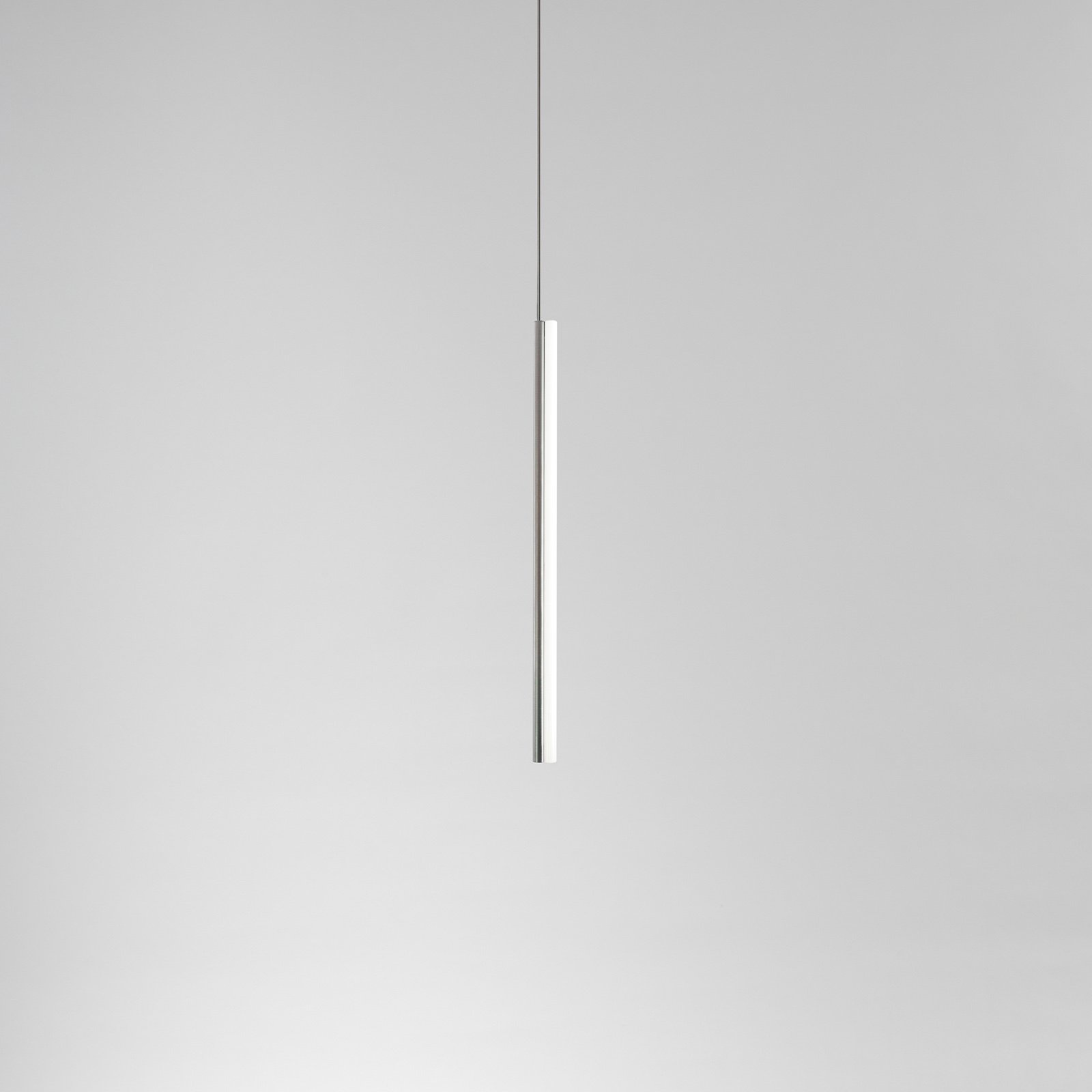 modern metal pendant tube light by Michael Anastassiades