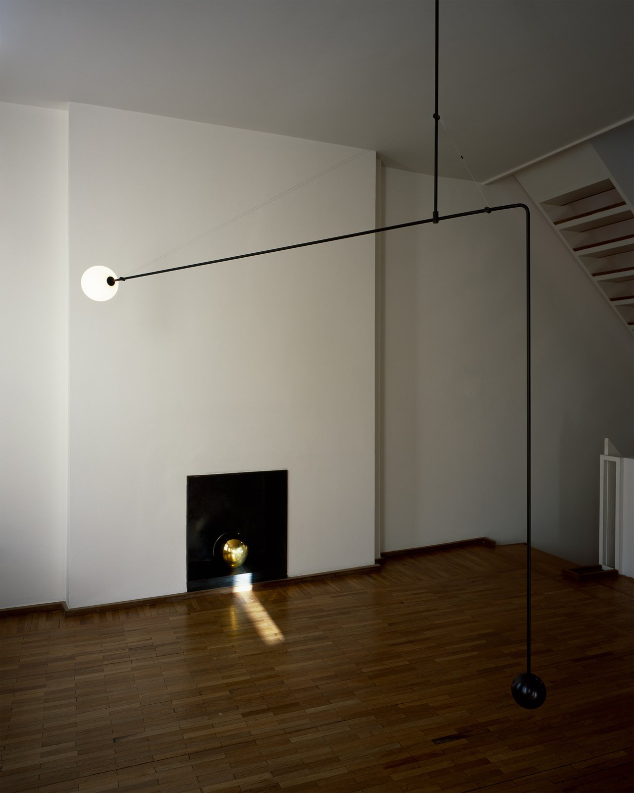 modern mobile pendant chandelier in brass by michael anastassiades
