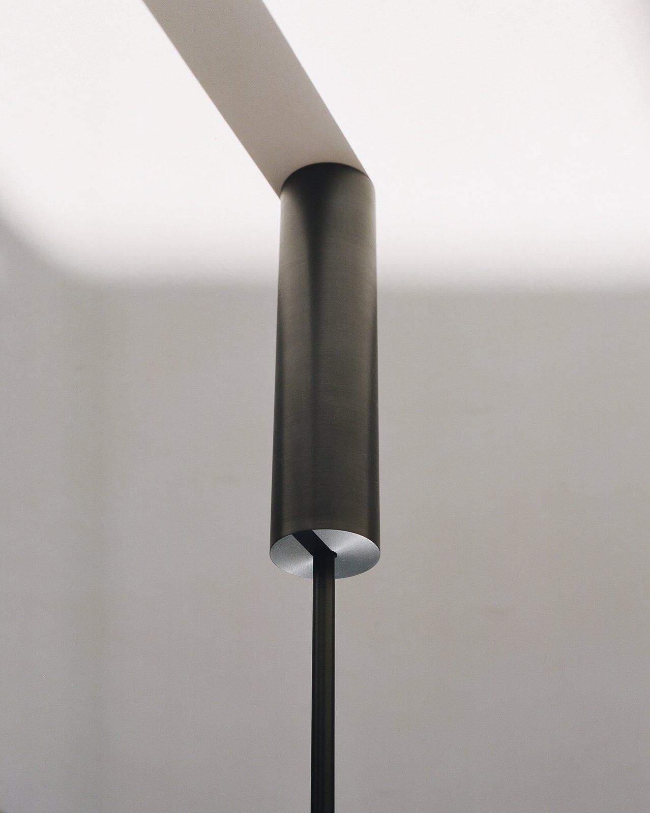 modern metal pendant tube light by Michael Anastassiades