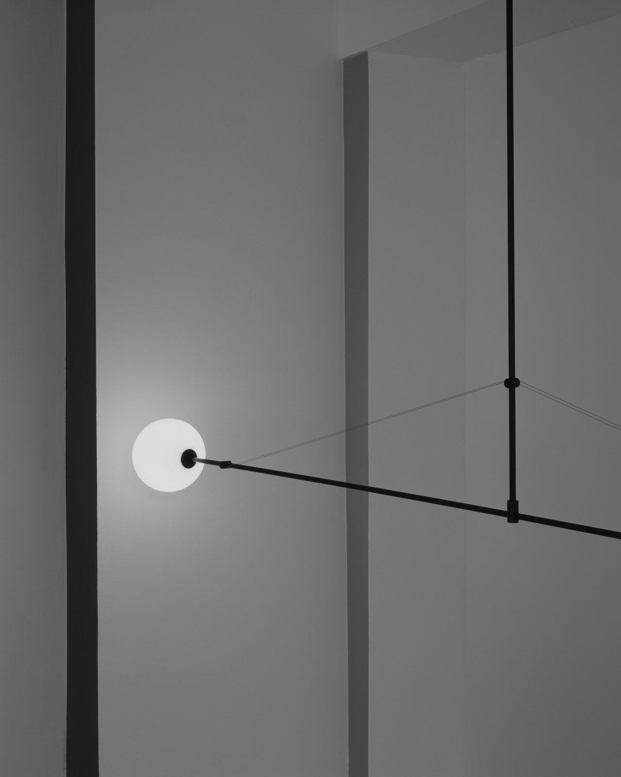 modern mobile pendant chandelier in brass by michael anastassiades
