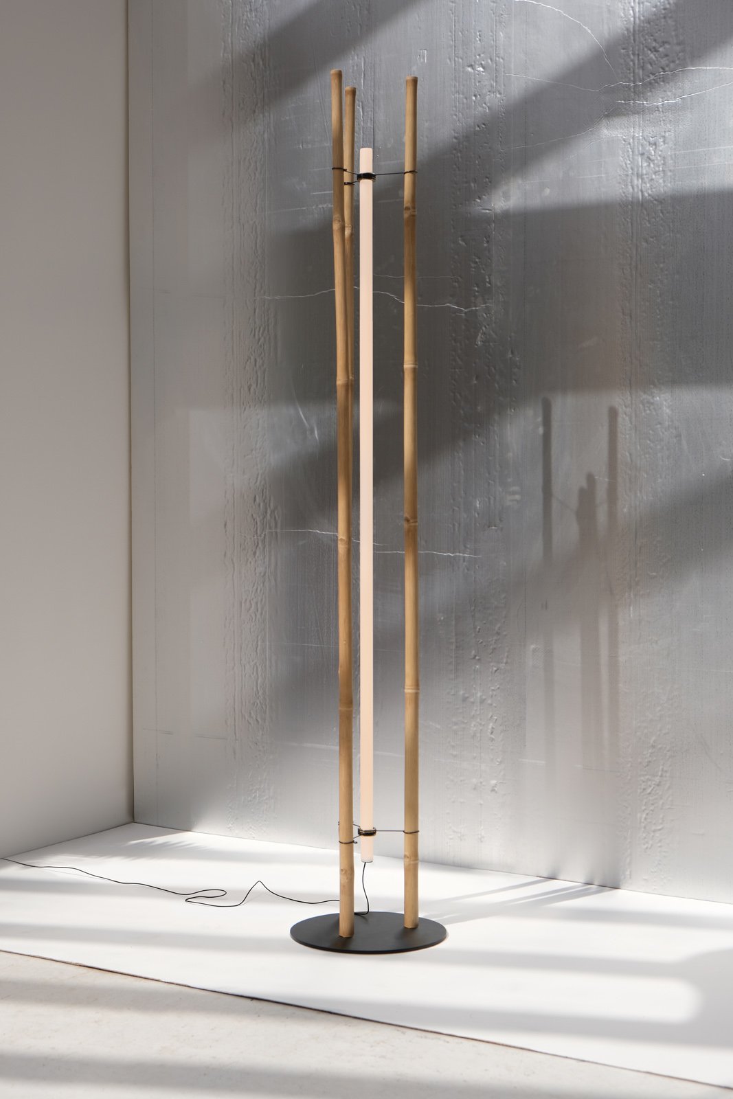 modern minimalist bamboo tube floor lamp by Michael Anastassiades
