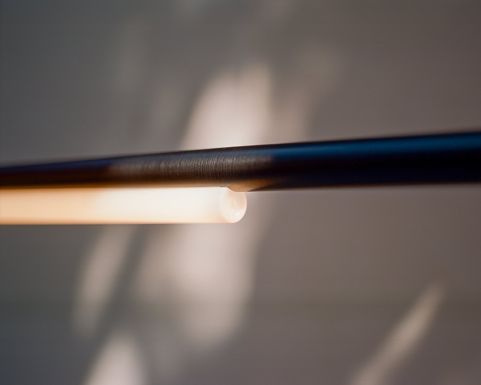 aluminum metal minimalist modern tube light pendant by Michael Anastassiades