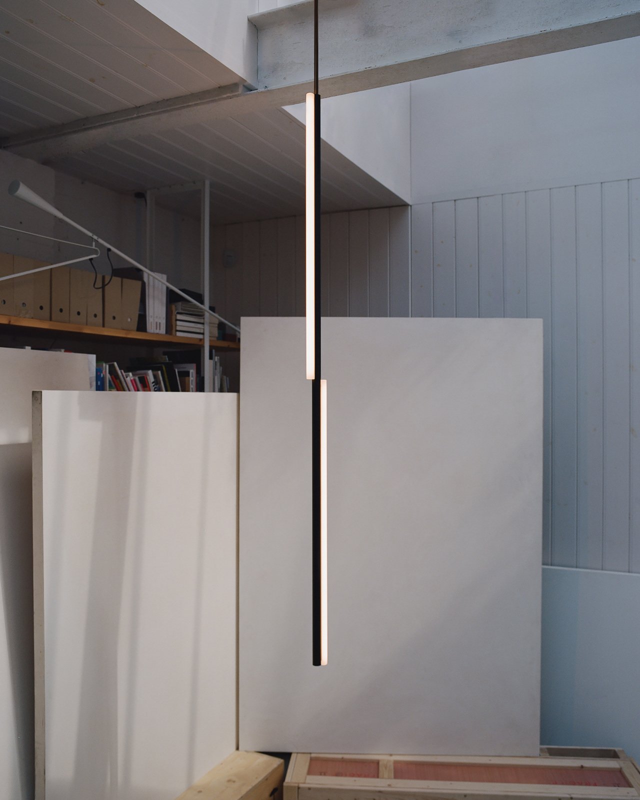 modern metal pendant tube light by Michael Anastassiades