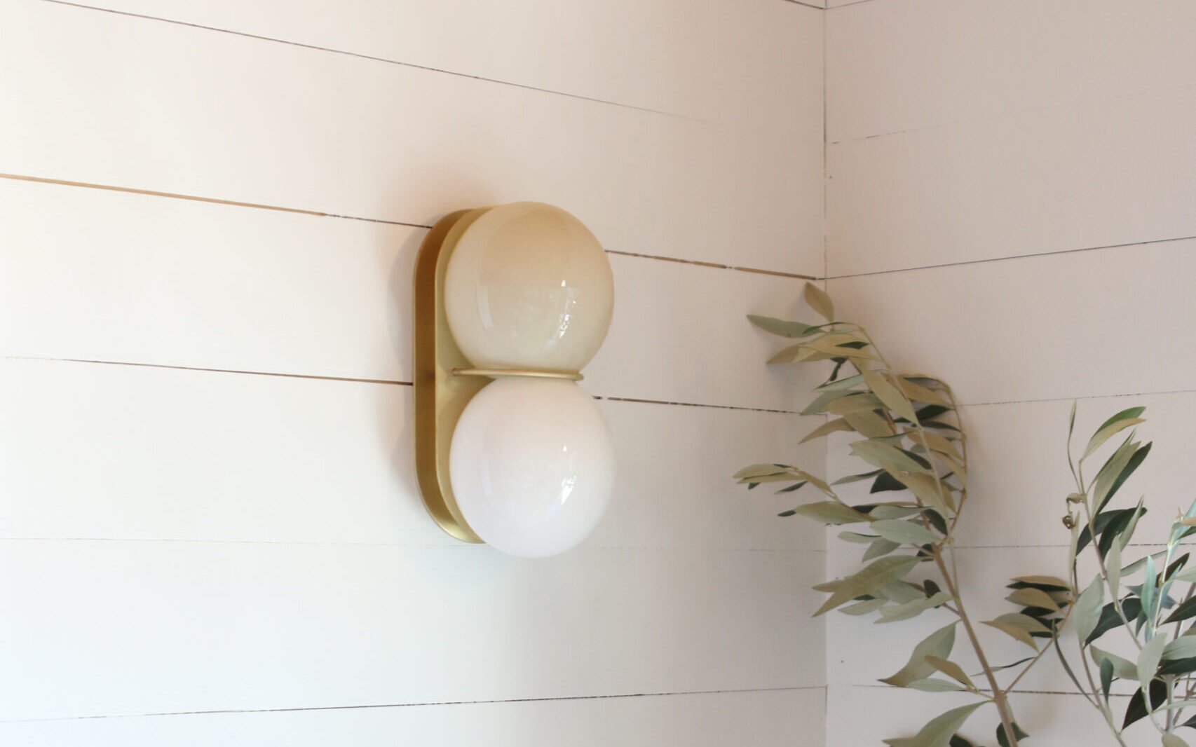 SkLO_Twin2.0_Sconce_Ceiling_LTM08WHTBB_ENV_01-copy-scaled-e1734133031825.jpg