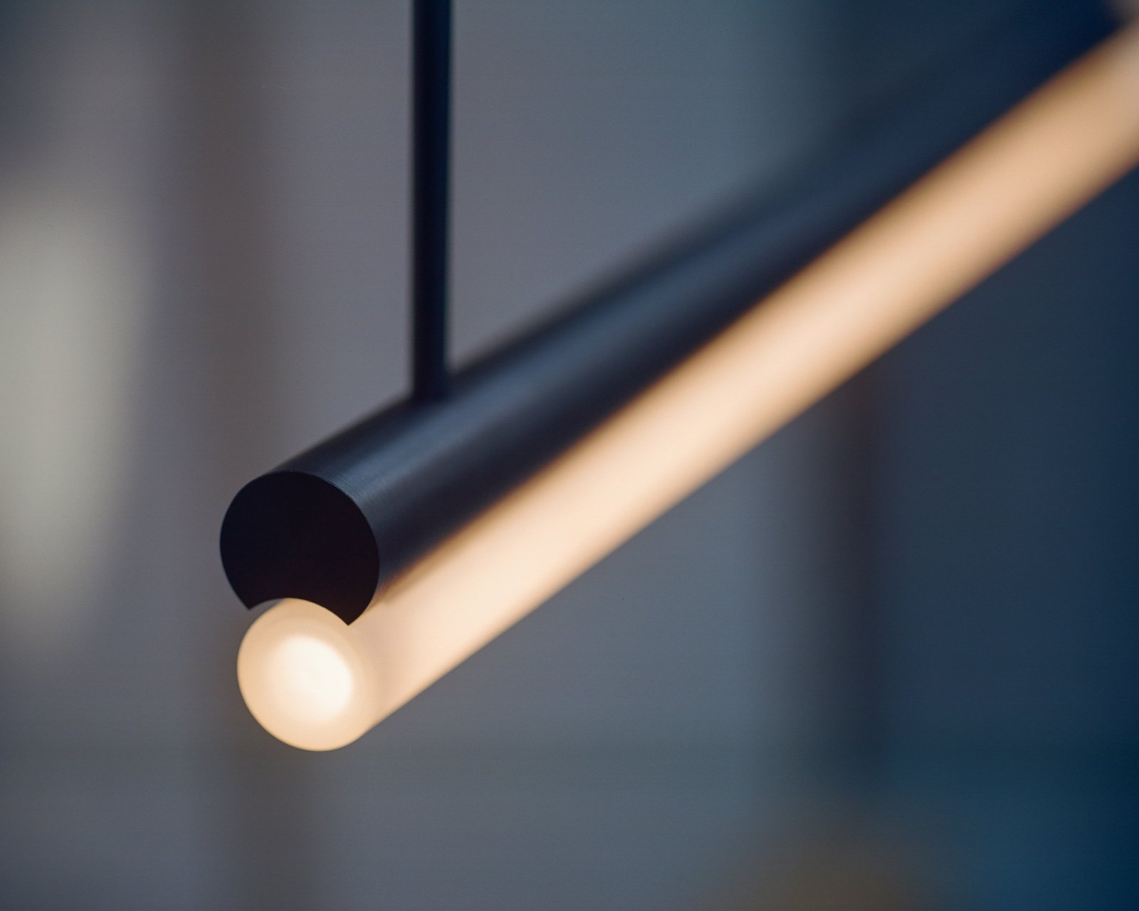 aluminum metal minimalist modern tube light pendant by Michael Anastassiades