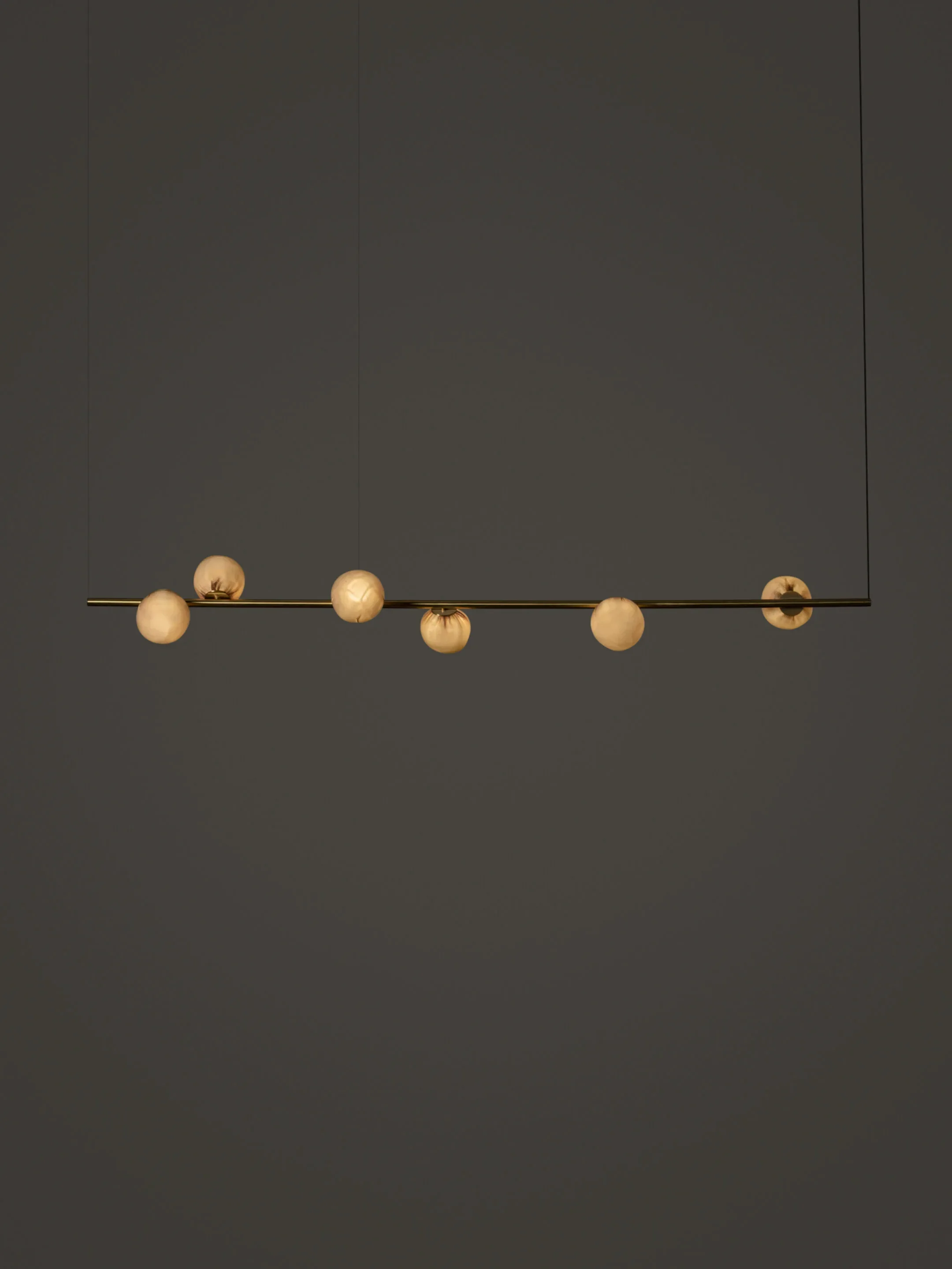 84.6-SuspendedH-Brass-Dark.jpg.webp