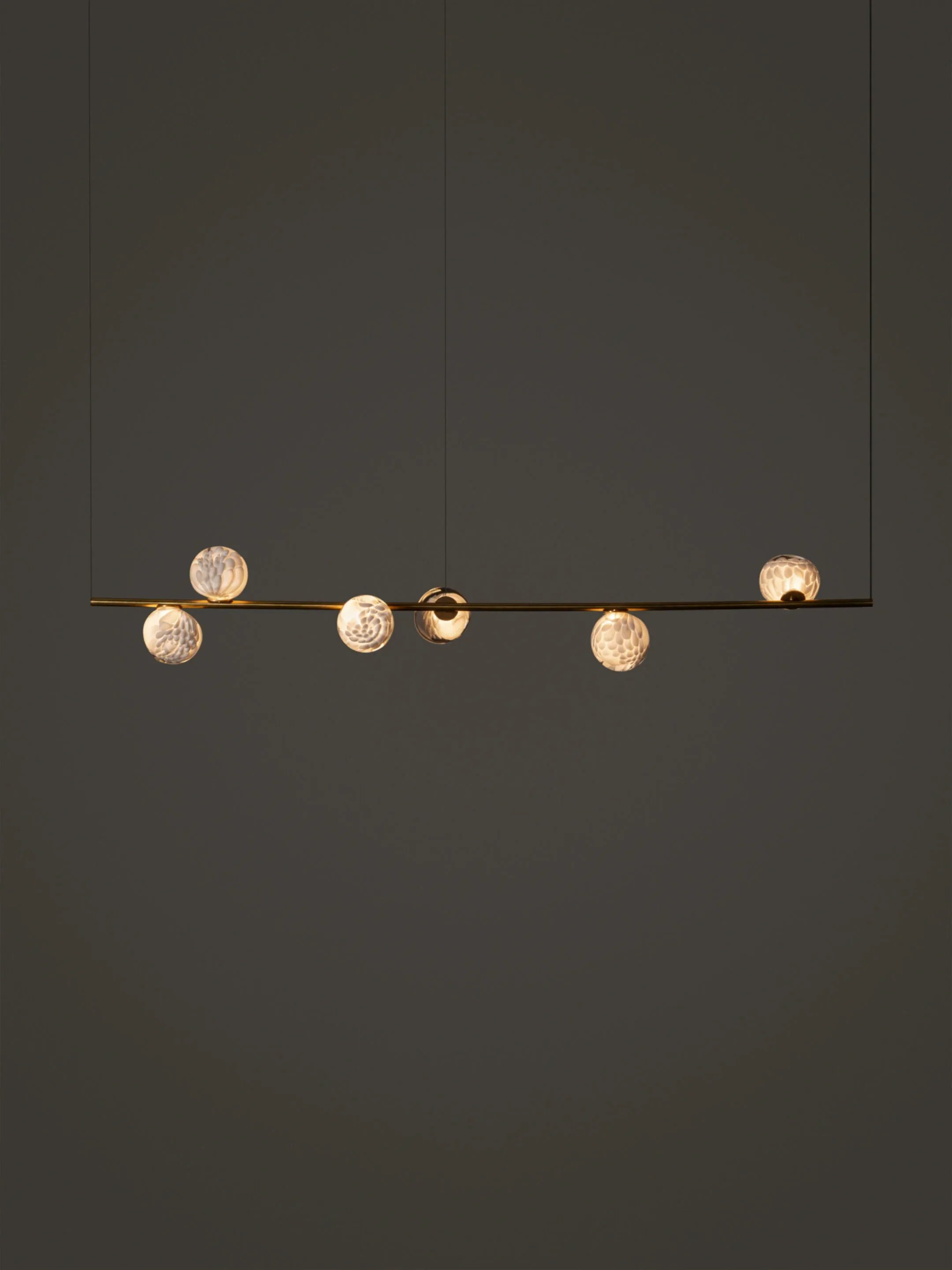118.6-SuspendedH-Brass-Dark.jpg.webp