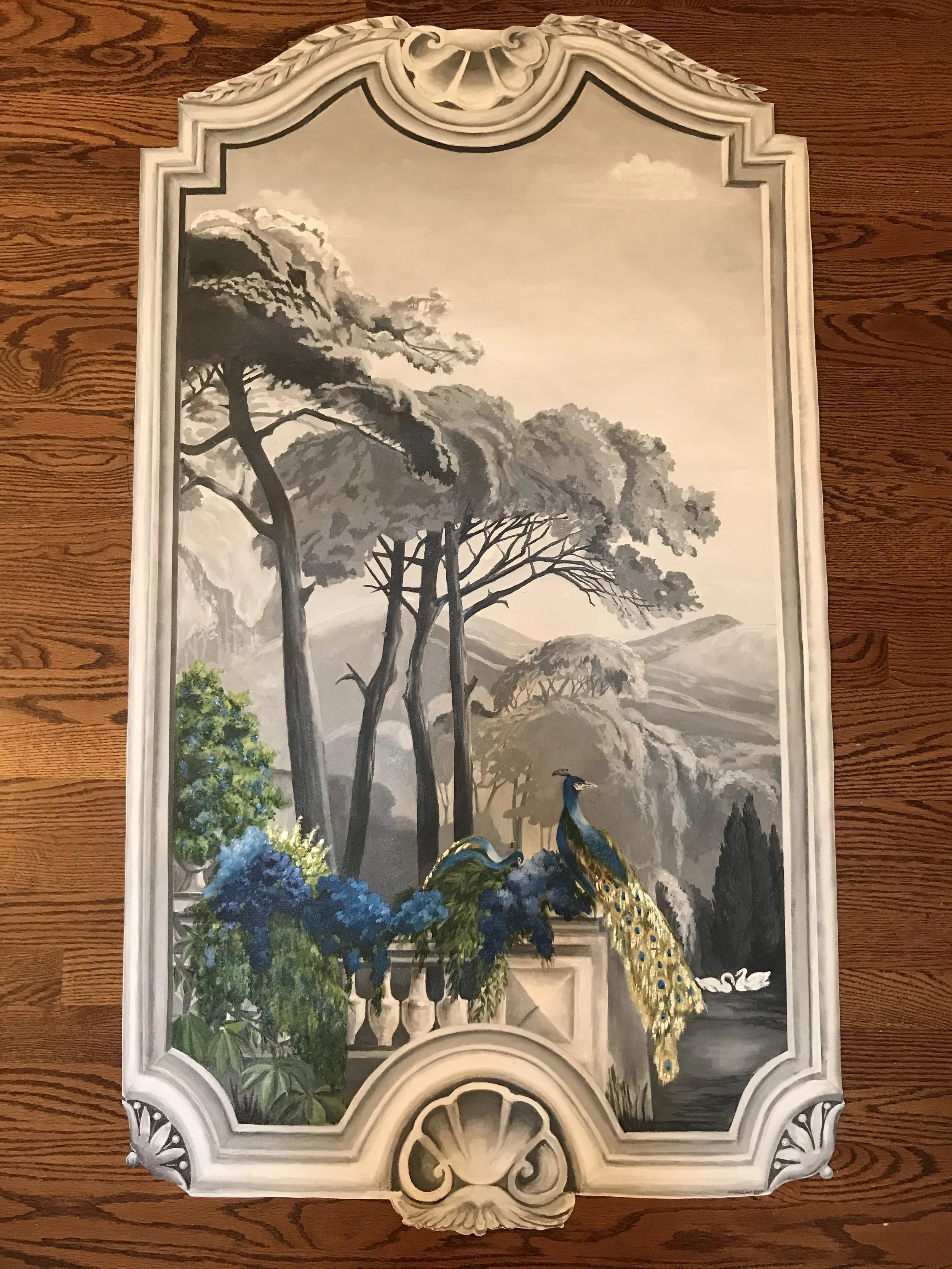 This canvas is not yet installed and will be mounted over traditional white wood fireplace mantle. It is done in a grisaille technique (grays plus white)....almost, but with added pops of blue.