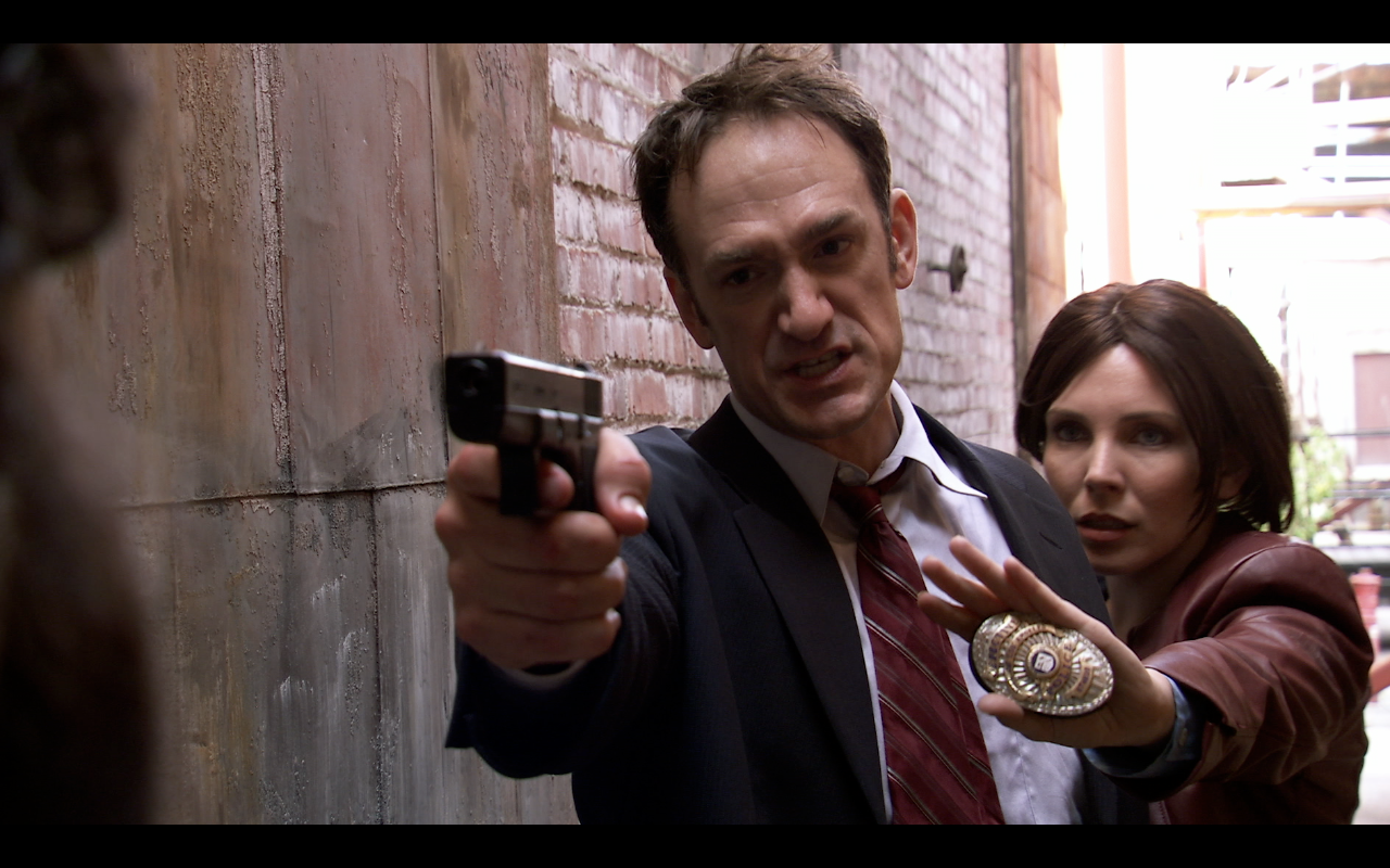 Seth Morris and June Diane Raphael in "United States Police Department"