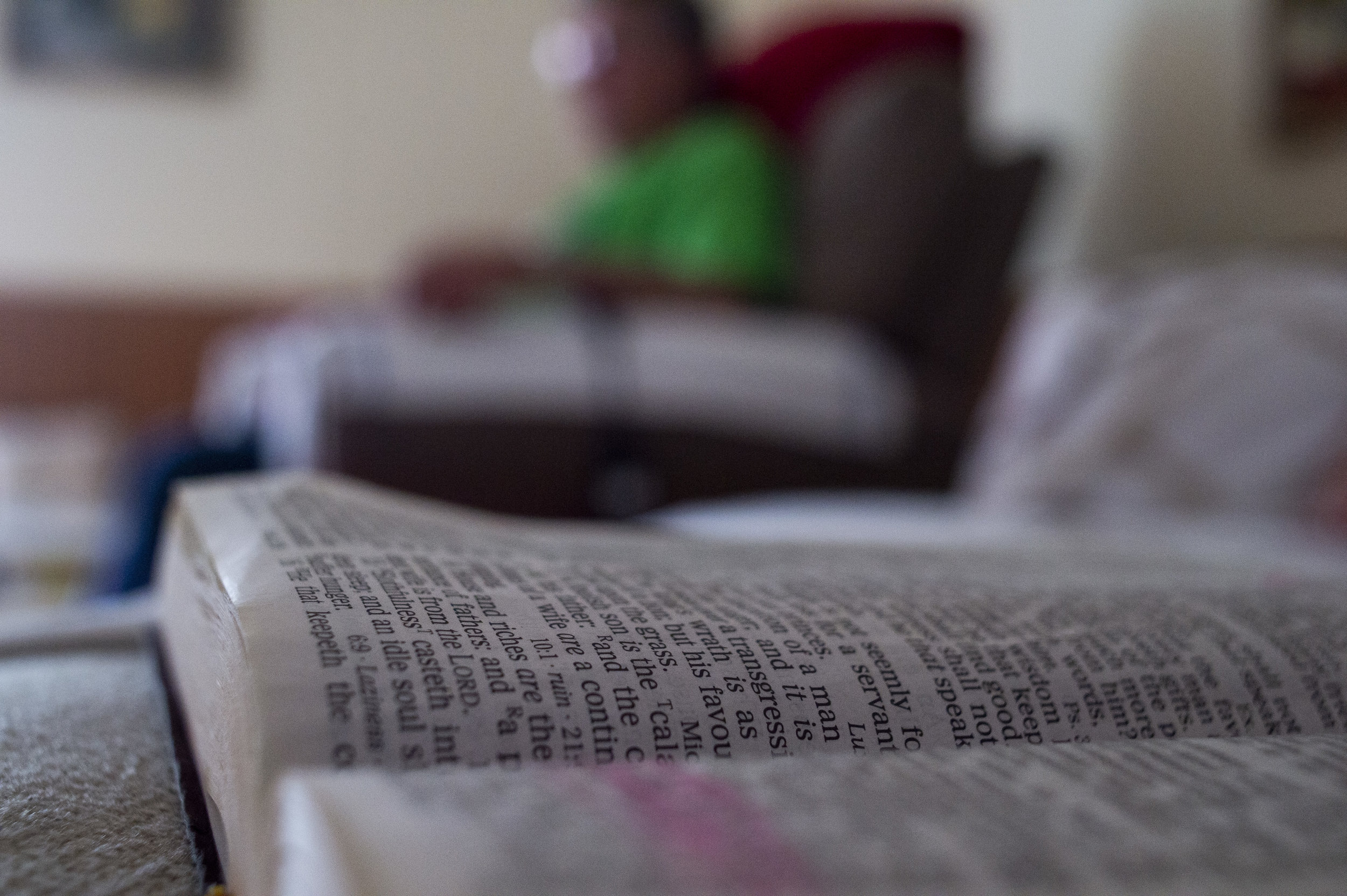  Charles Shortridge sits in his living room in his home near Meadowview, Virginia on Friday, January 18. A bible sits open nearby on the couch, with many ailments affecting his daily life, Charles notes that his faith plays a big role in his attitude