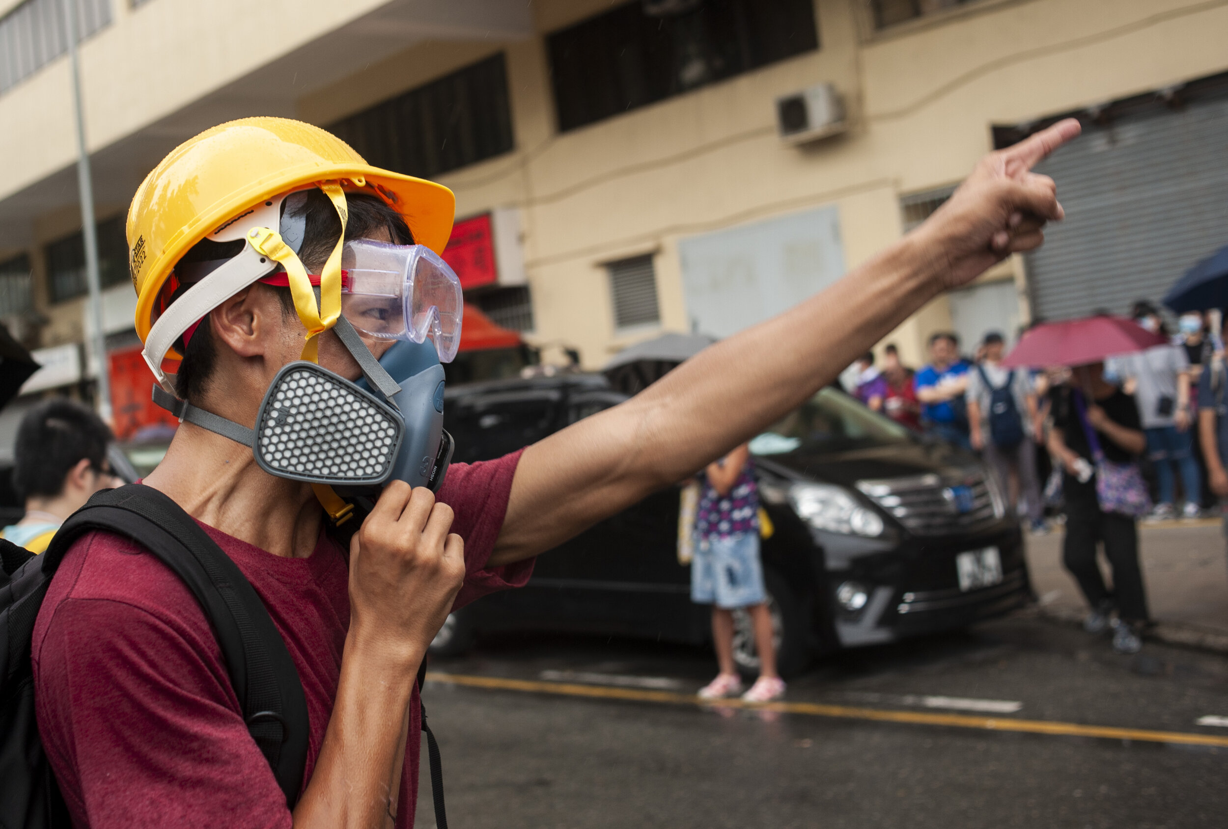  A pro-democracy protester shouts angrily at a police van as it drives by during a protest in Hung Hom on August 17, 2019. In the week following pro-democracy protesters occupying the Hong Kong Airport there was a lull that saw fewer violent clashes 