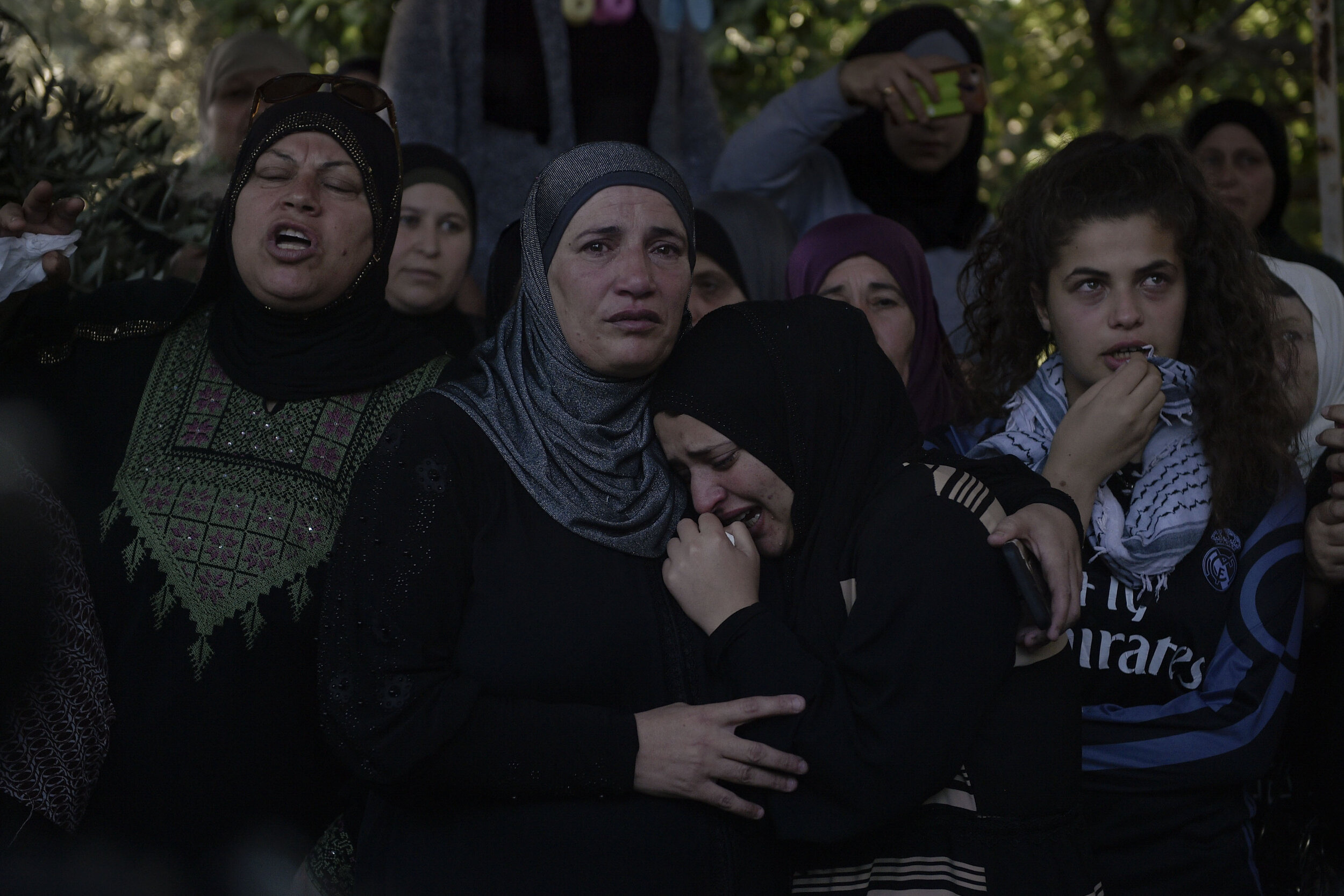  The family of 17 year old Izzmi Tamimi break into tears as his body is brought back to his home after being released by the Israeli Defense Force. Tamimi was killed in his front yard in the West Bank village of Nabi Saleh. Tamimi was shot in the bac