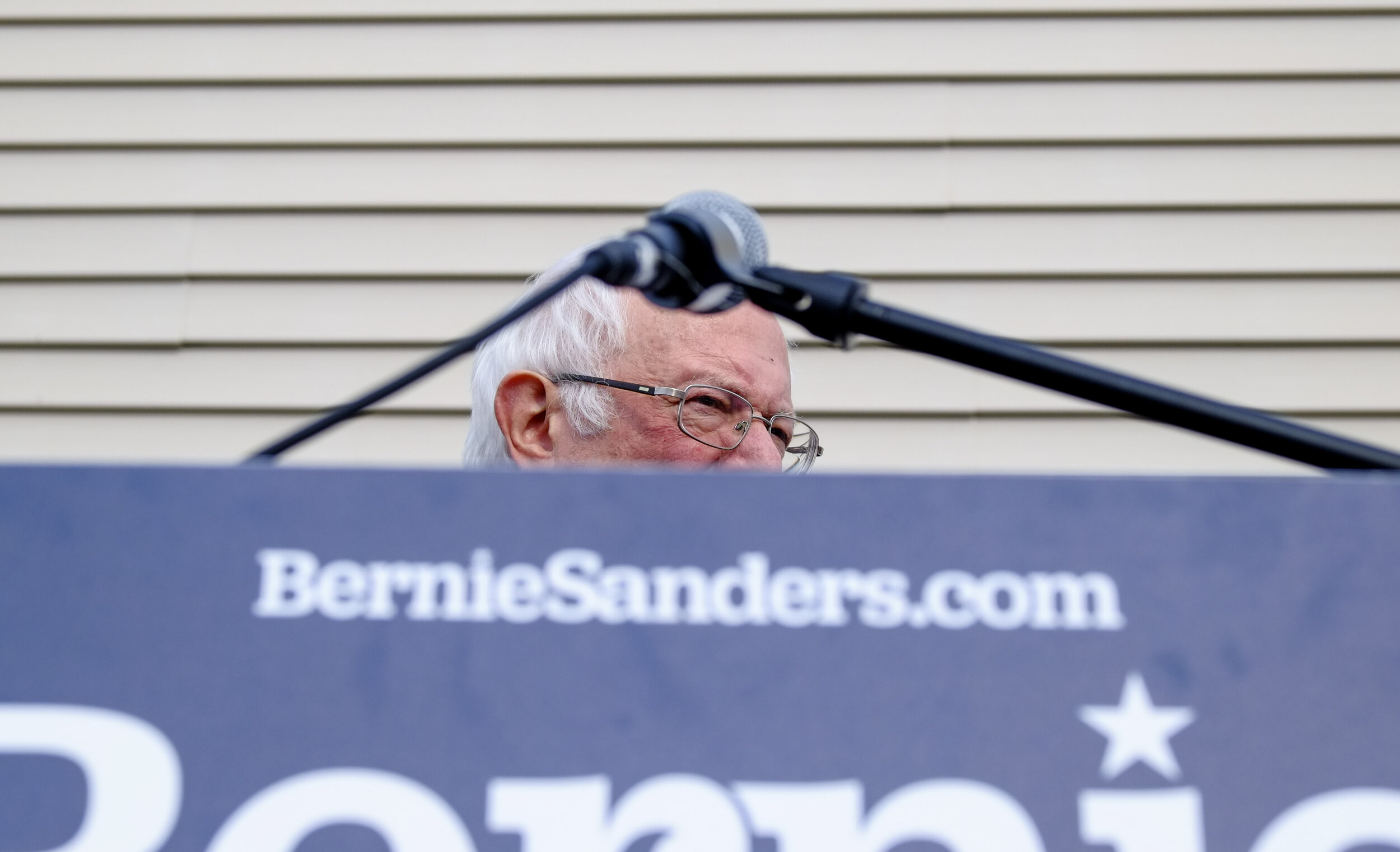  Democratic candidate Bernie Sanders leaves the podium after addressing a small crowd outside of Cedar Rapids, Iowa the day before the Iowa Caucuses on February 2, 2020. 
