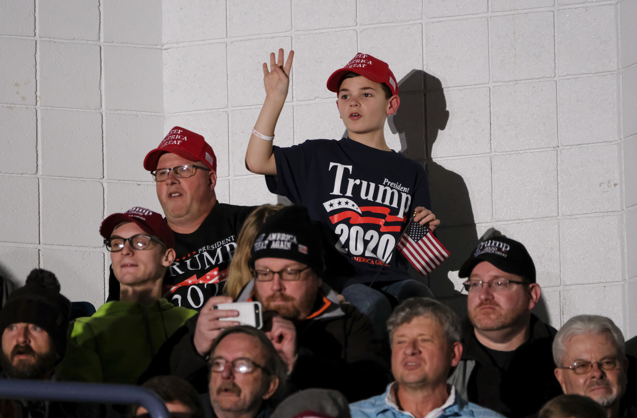  A young Trump supporter joins in a mass chant of ‘Four more years’ during a Trump rally held in Battle Creek, Michigan on December 8, 2020. 