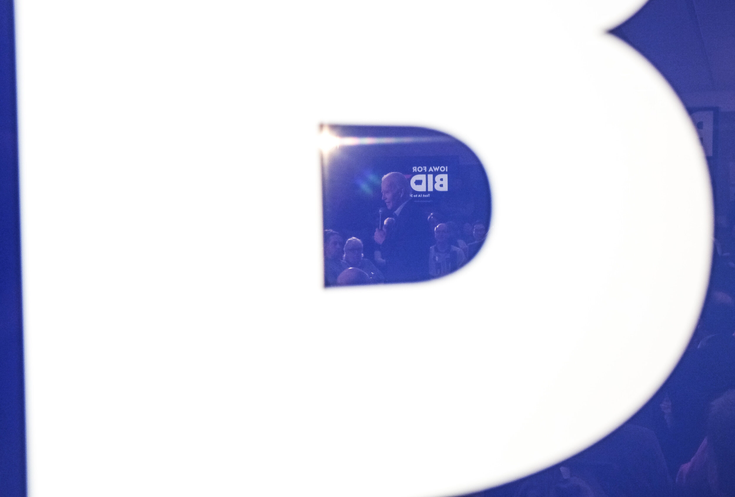  Joe Biden, the former Vice President and Democratic candidate, is reflected in a campaign sign as he delivers a speech to a small group of supporters in Fort Madison, Iowa on February 1, 2020. 