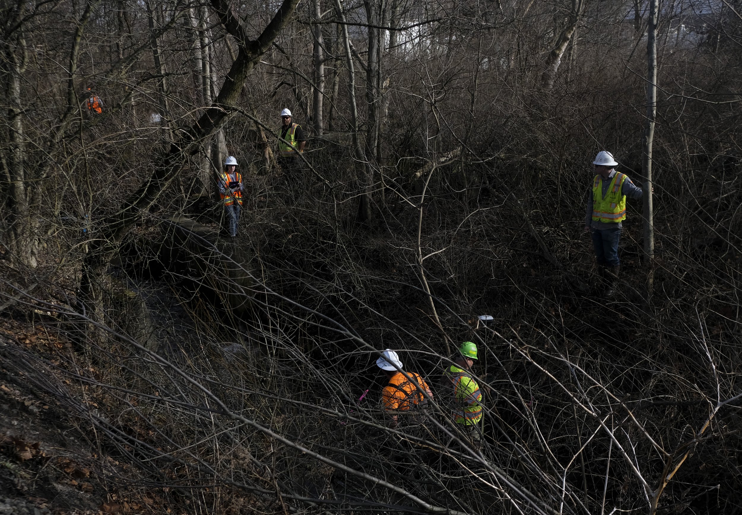  Members of the Environmental Protection Agency take samples of water from Sulphur Run near the rail road tracks in East Palestine, Ohio on Thursday, February 23, 2022. Chemicals from a Norfolk Southern freight train spilled into water ways after it 