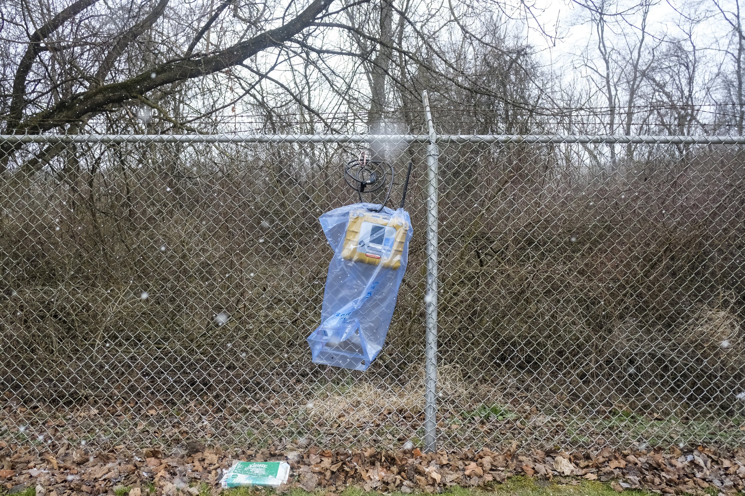  An Environmental Protection Agency air monitoring device is secured to a fence on East Martin Street which runs parallel to the Norfolk Southern train crash site in East Palestine, Ohio on Friday, February 17, 2023. The EPA has placed air monitoring
