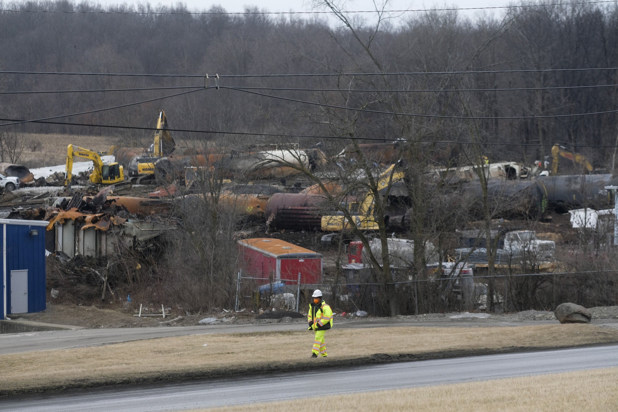  A clean up crew worker walks down East Taggart Street during clean up operations near the derailed train in East Palestine, Ohio, US, on Thursday, Feb. 16, 2023. Nearly two weeks after a train carrying carcinogenic chemicals derailed in East Palesti