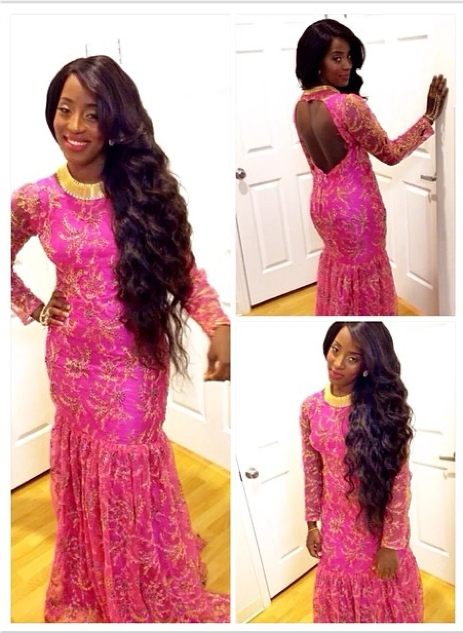 This floor length lace gown with a dropped waist gathered skirt was a definite show stopper. Her elegant tresses and alluring gold accessories made it impossible to look away, definitely a top look of the evening.