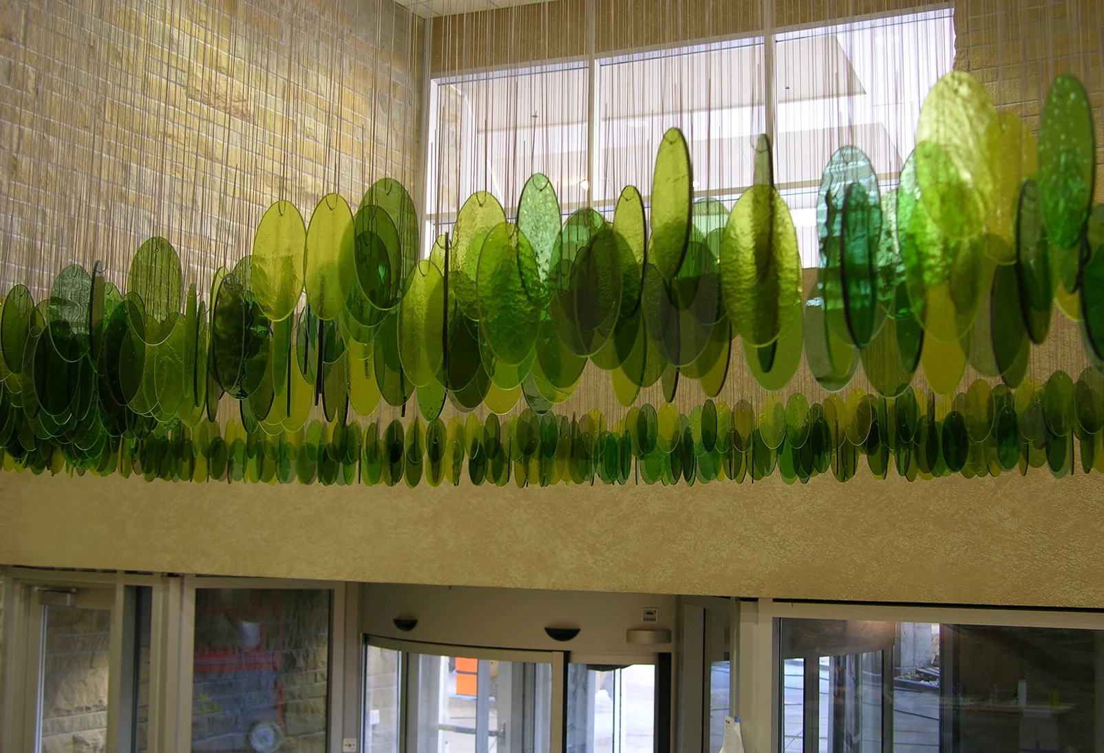 Link, 2007. Saint Alphonsus Regional Medical Center (central tower lobby); Boise, ID. Glass, steel. 10.5'h x 11'w x 5.5'd. Commissioned by Saint Alphonsus Regional Medical Center. View Installation Process