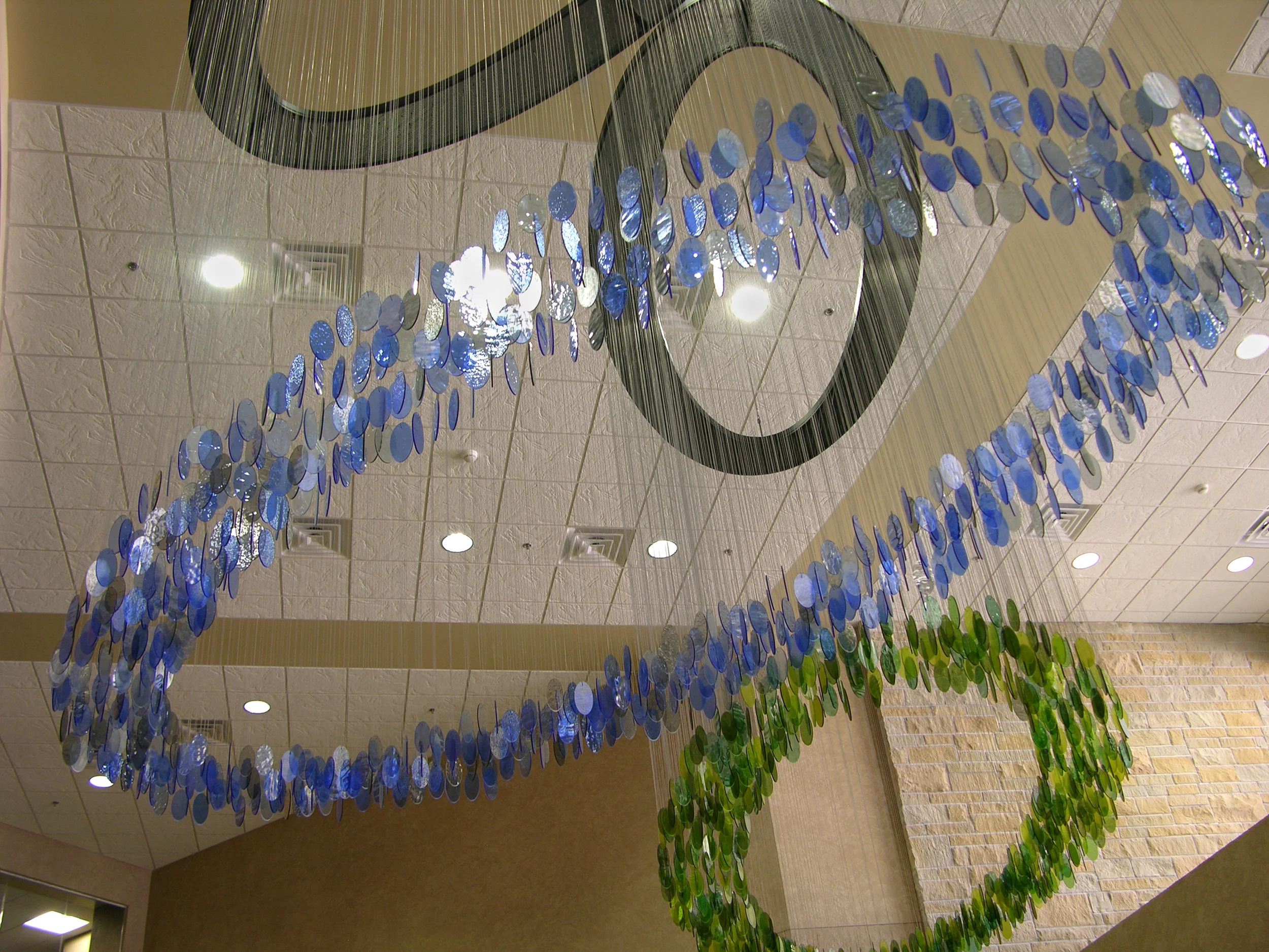 Link, 2007. Saint Alphonsus Regional Medical Center (central tower lobby); Boise, ID. Glass, steel. 10.5'h x 11'w x 5.5'd. Commissioned by Saint Alphonsus Regional Medical Center. View Installation Process