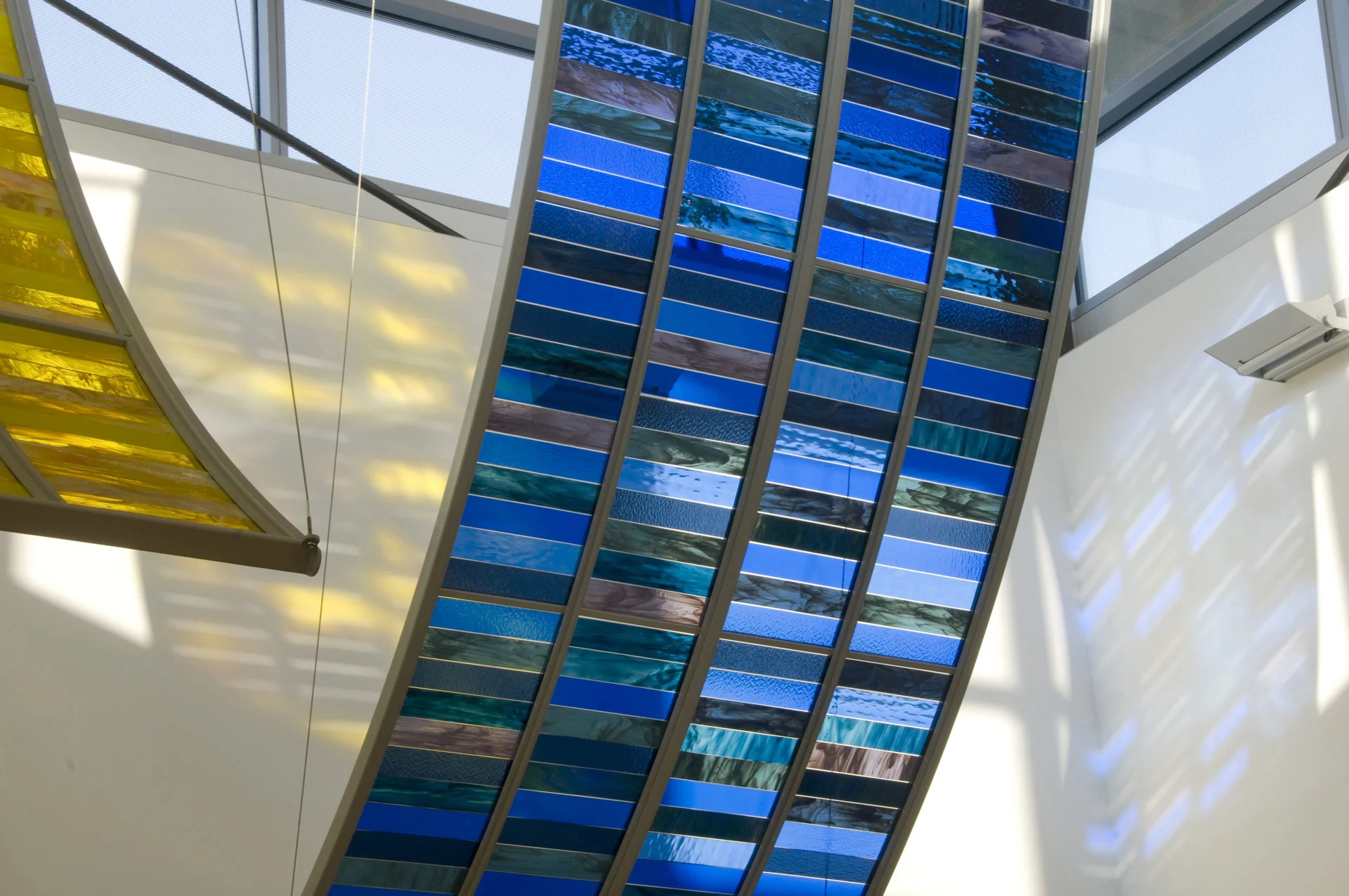 Long Day / Long Night, 2008 | Fairbanks International Airport; Fairbanks, AK. Glass, steel. 18'h x 14'w x 8'd. Commissioned by Alaska Department of Transportation and Public Facilities. View Installation Process